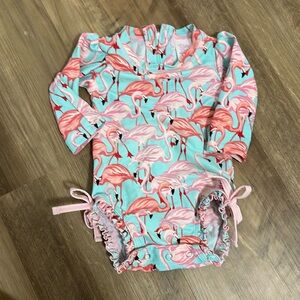 Ruffle butt one piece 3 to 6 months very good use condition